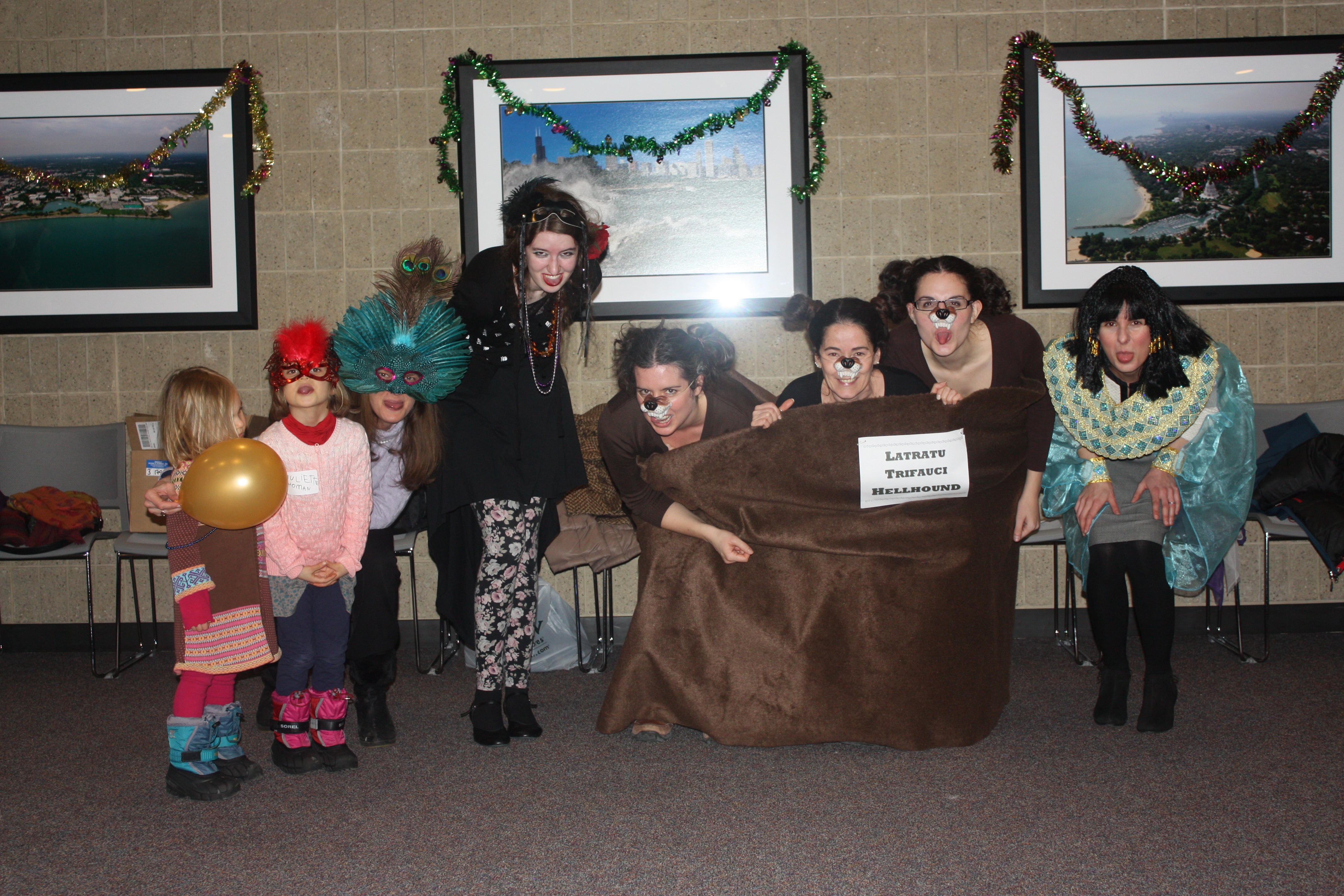 A group of professors, graduate students, undergrads and faculty kids in costume